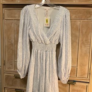 Brand new with tags, gorgeous polka dot dress. Smoke & pet free home.